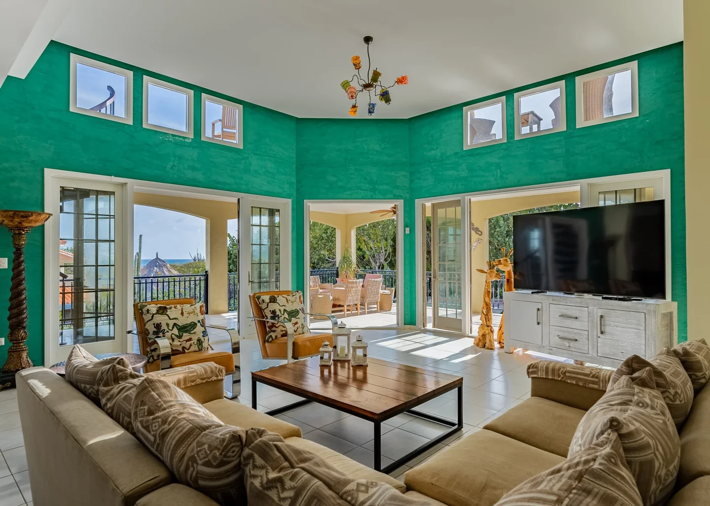 Emerald-green living room at L.G. Smith Boulevard 532 E, the separate Malmok tour property